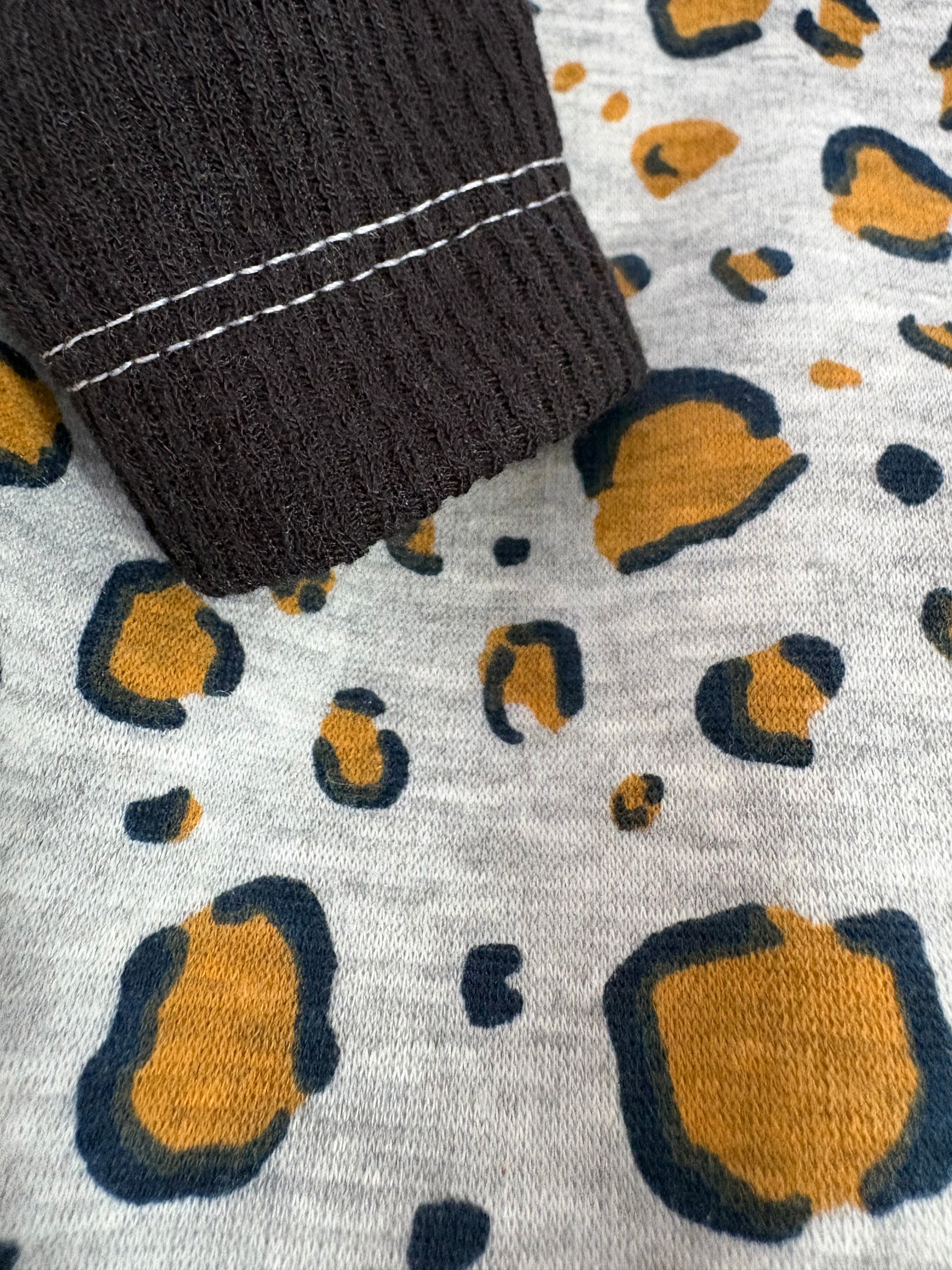 Beautiful Italian Greyhound and Whippet clothing made in the UK. Shop fleece coats, jersey tops, pyjamas, onesies, vests and more at Iggy Suits London.